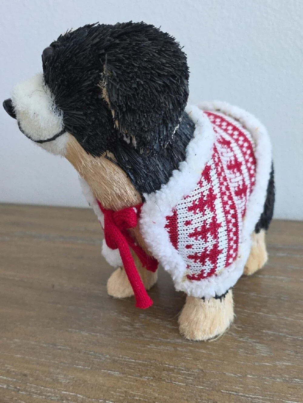Pier 1 Black Tan Cream Straw Dog with Red Knit Cape